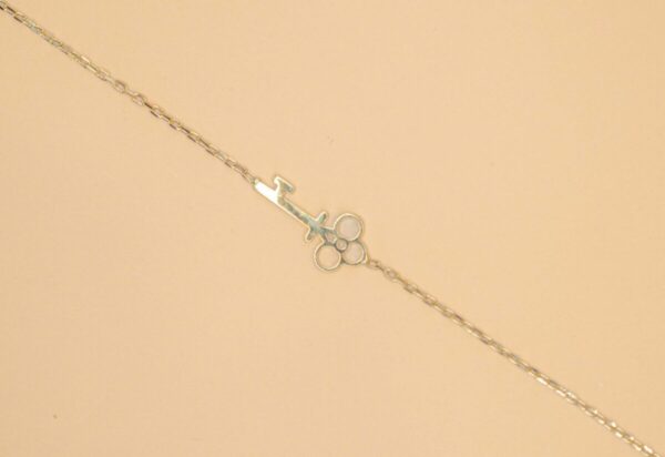 Armband med nyckel berlock