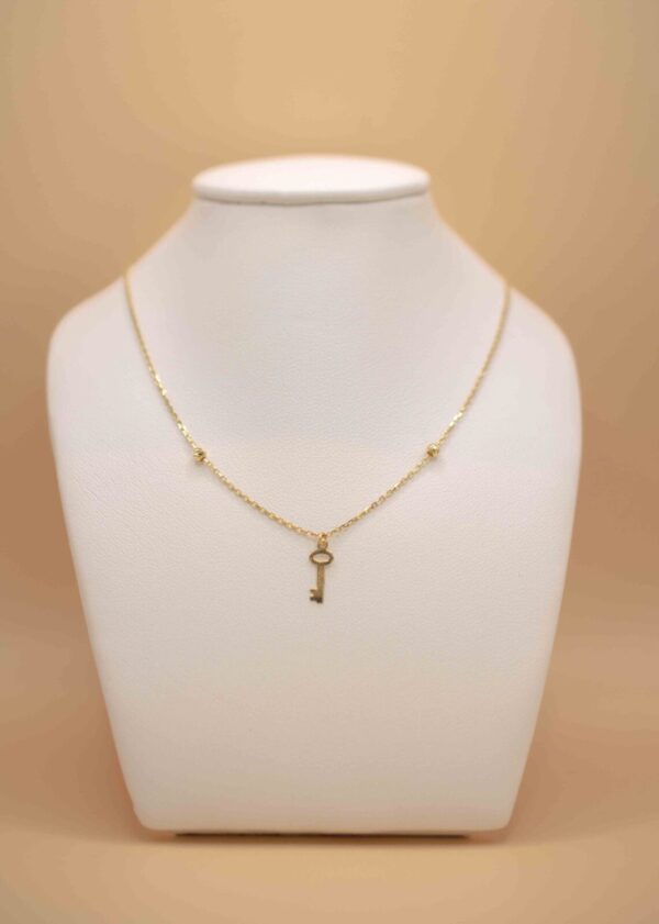 Halsband med nyckel berlock